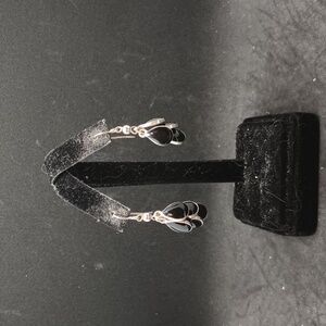 Silver tone black teardrop shape cluster earrings